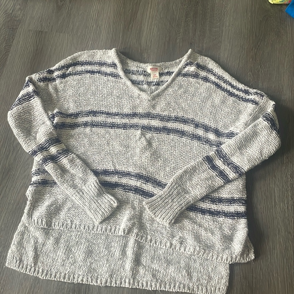 Sweater. Very comfortable and cute. Size small